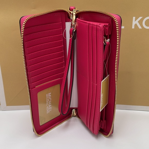 MICHAEL KORS
Leather Continental Wristlet Phone Case Wallet
Electric Pink
NWT - Picture 9 of 16